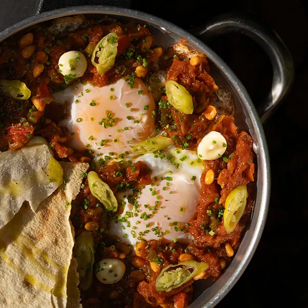Titaina con huevos fritos